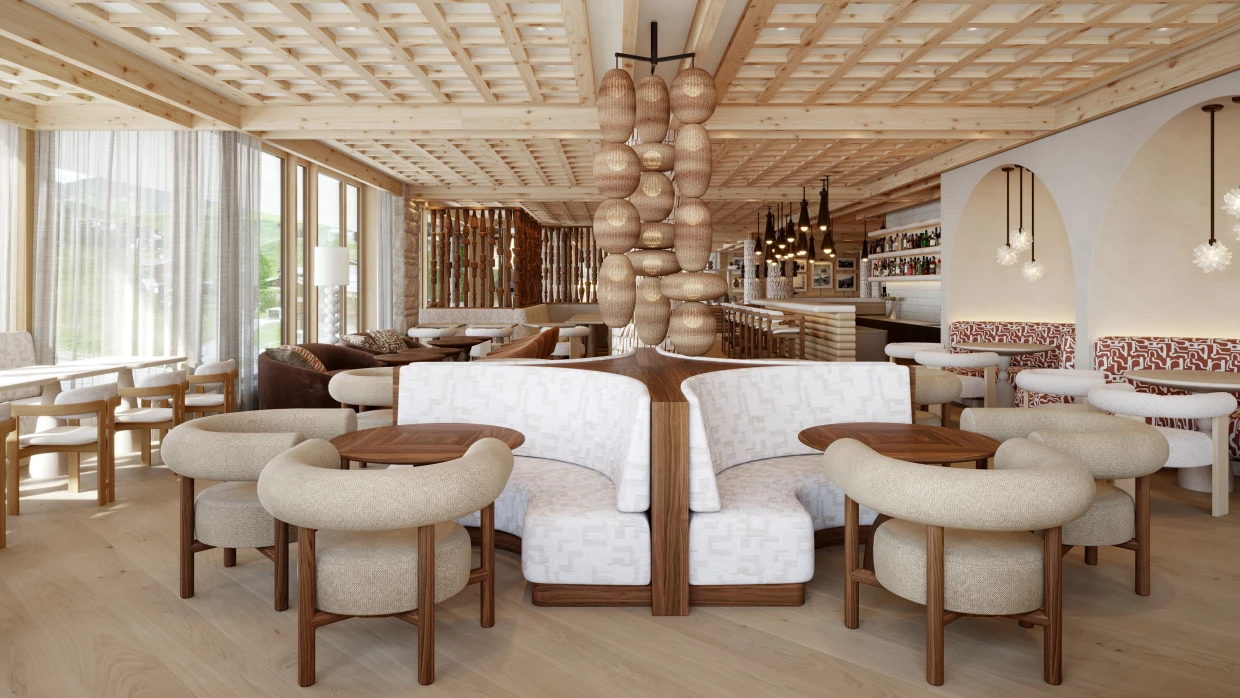 Lobby of a luxury hotel in the Alps with unusual armchairs in natural tones