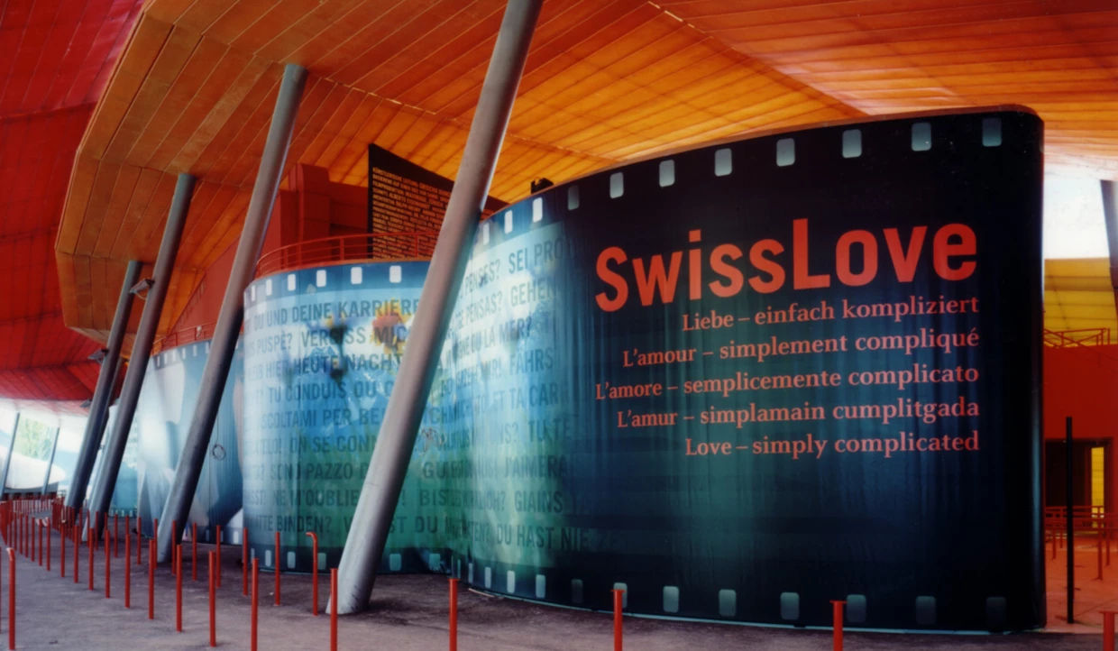 SwissLove exhibition with large texts on a curved wall