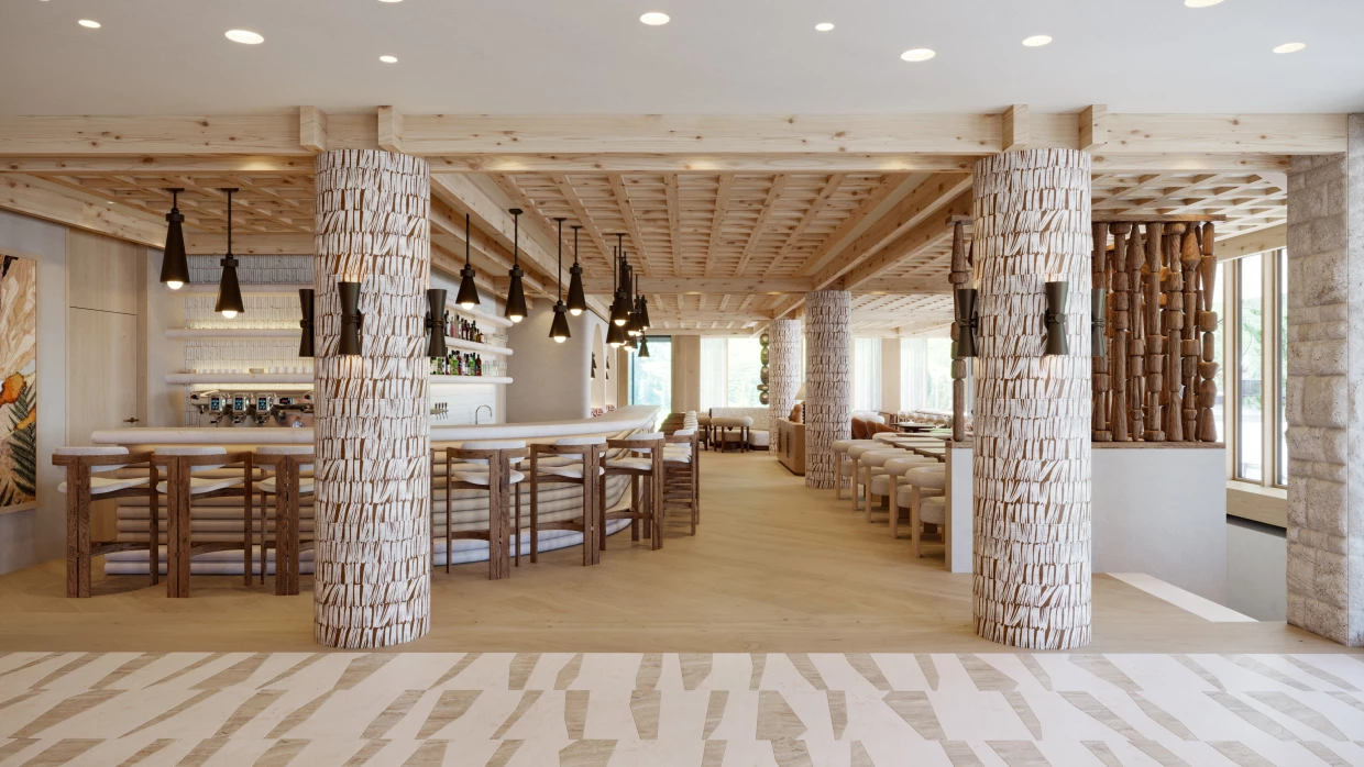 Bar of a luxury hotel in the Grisons Alps in beige natural tones
