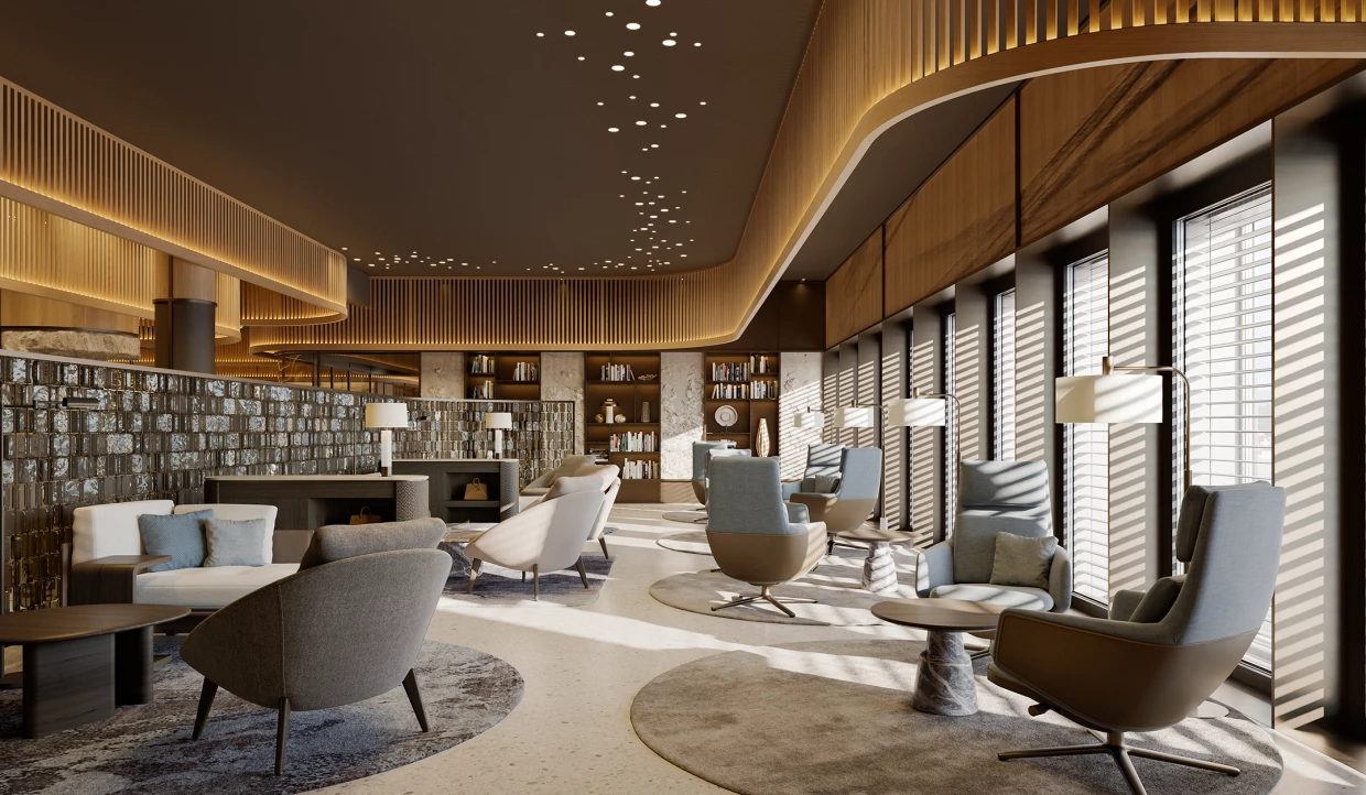 Lounge with bookshelves, armchairs, and large windows