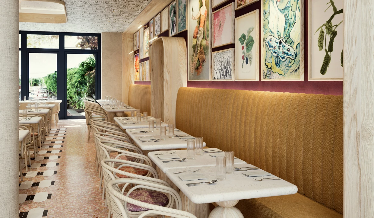Langes Sofa in Restaurant mit Kunstwerken an der Wand