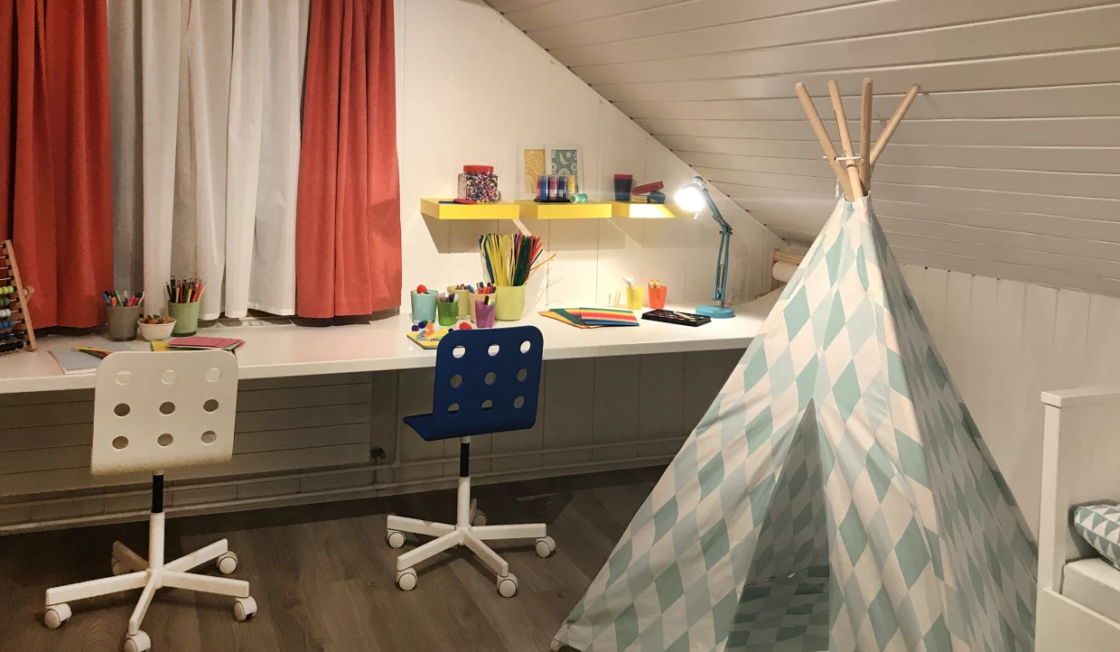 Workspace with two chairs and a teepee tent
