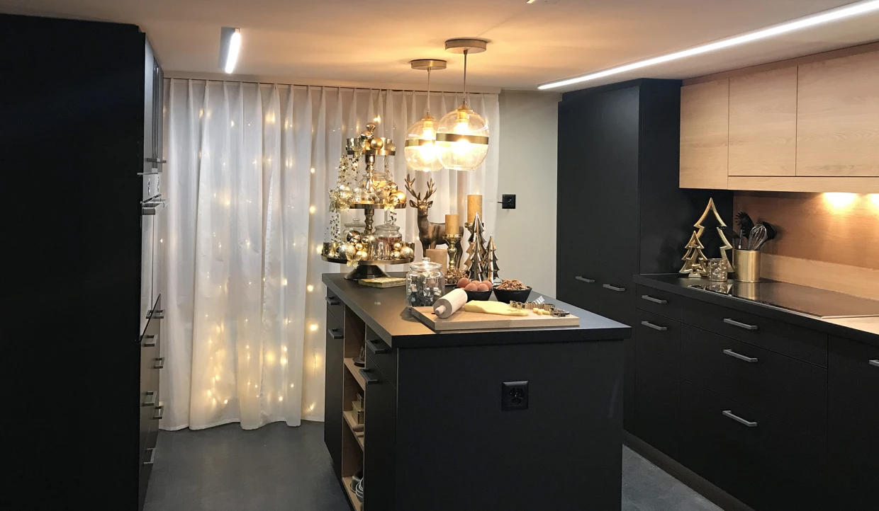 Kitchen with festive decorations and light curtain