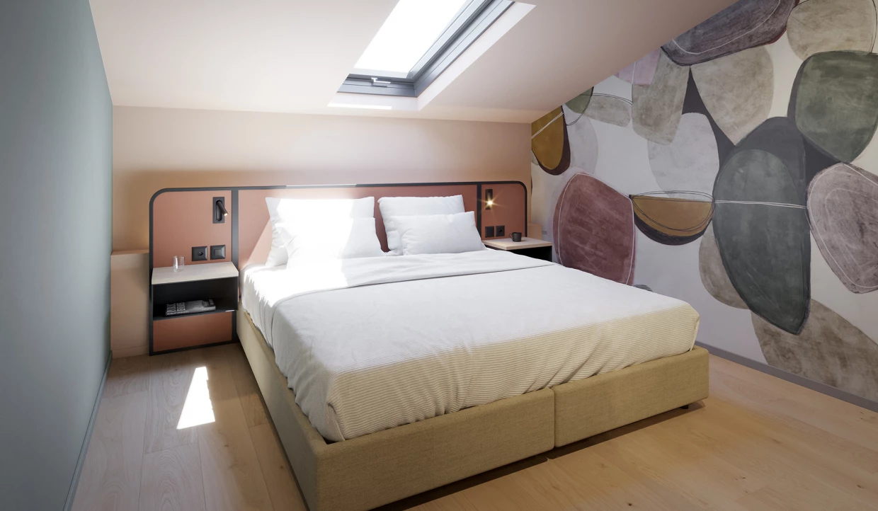 Bright bedroom with bed and skylight