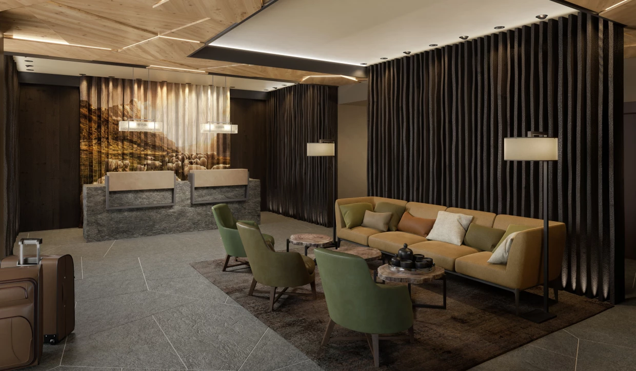 Hotel-Lobby mit Holzdecke, Sitzbereich und Rezeption aus Stein