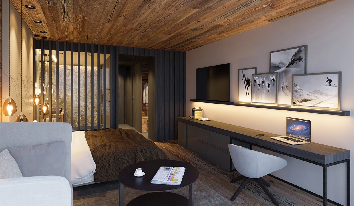 Hotelzimmer mit Bett, Schreibtisch und dekorativen Bildern