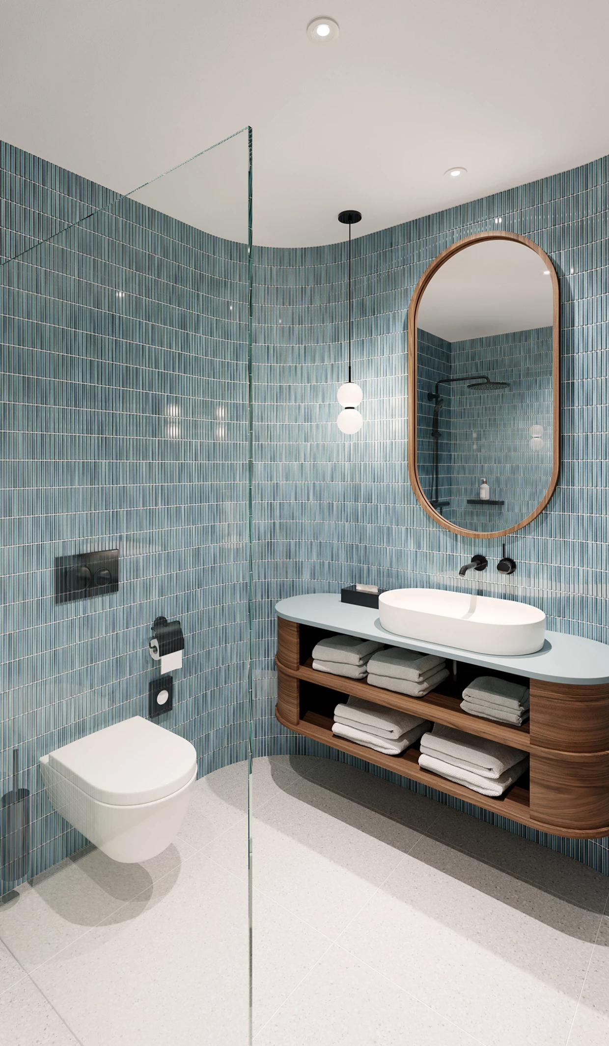 Modernes Badezimmer mit blauen Fliesen und ovalem Spiegel