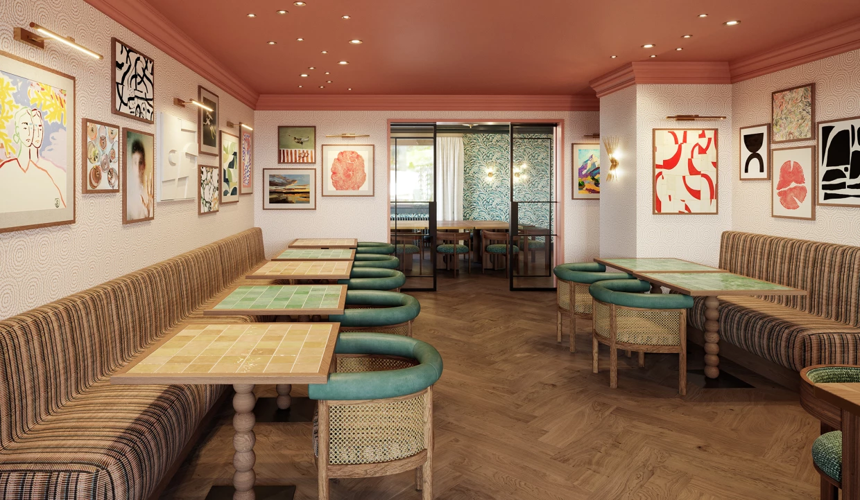 Wall with various artworks in a restaurant