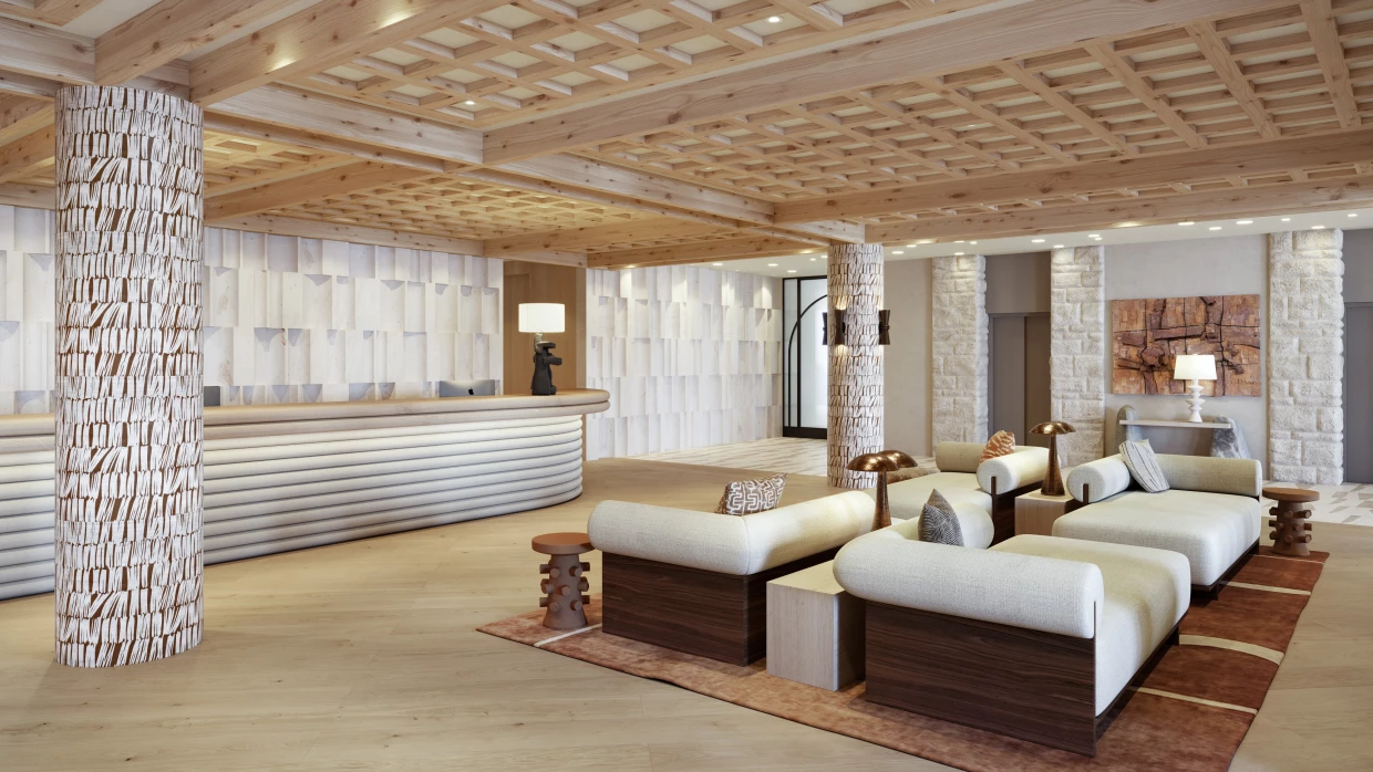 Reception and reception area of a luxury hotel in Arosa in beige tones