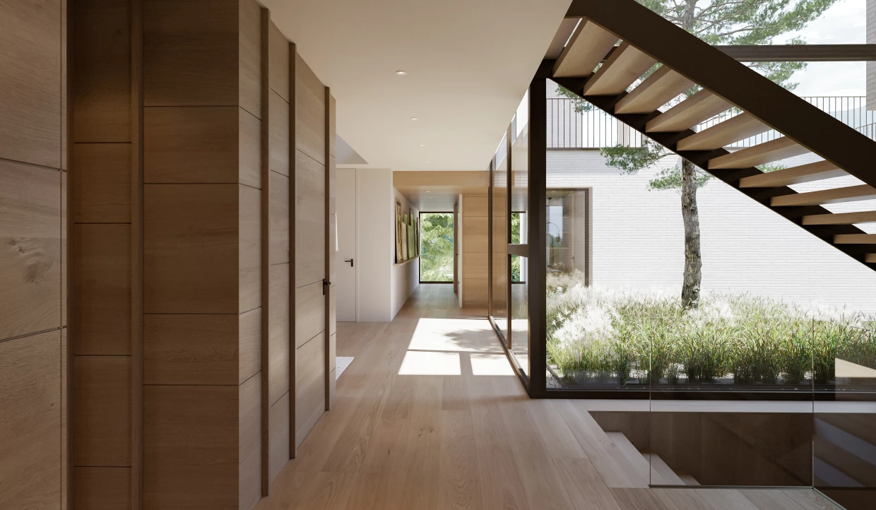 Modernes Treppenhaus mit Glaswand und Holzboden