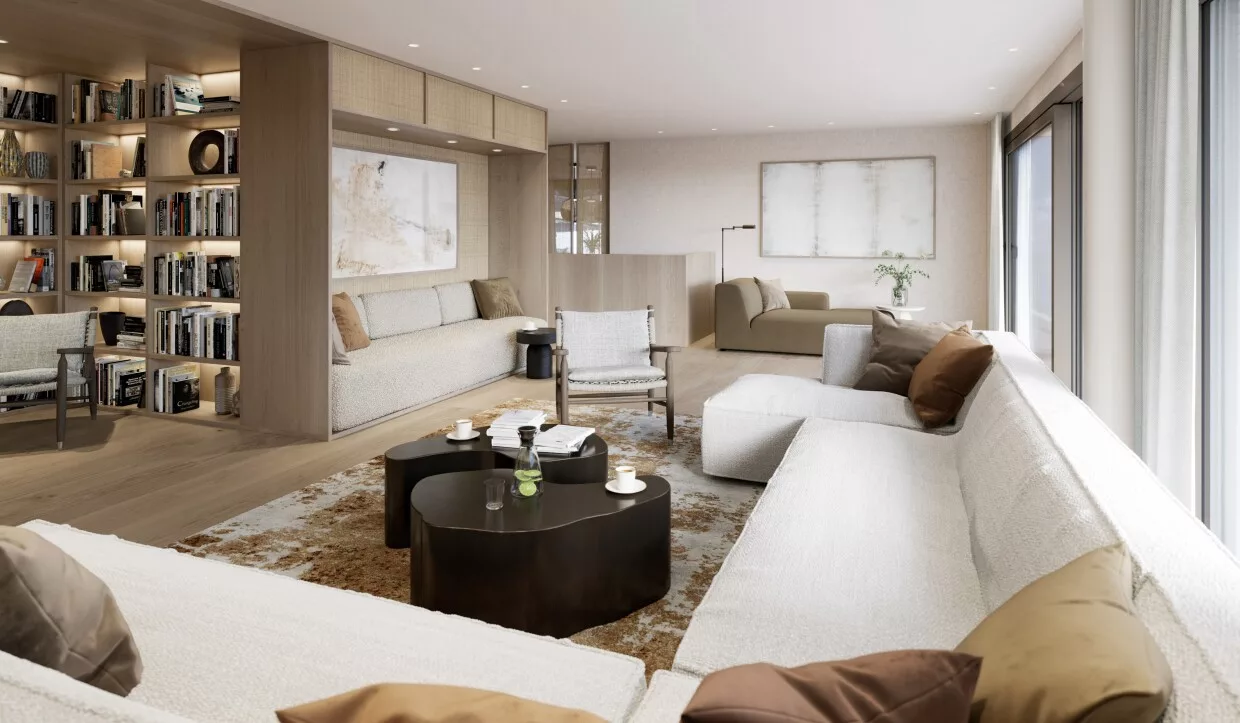 Living room with large sofas and wooden shelves