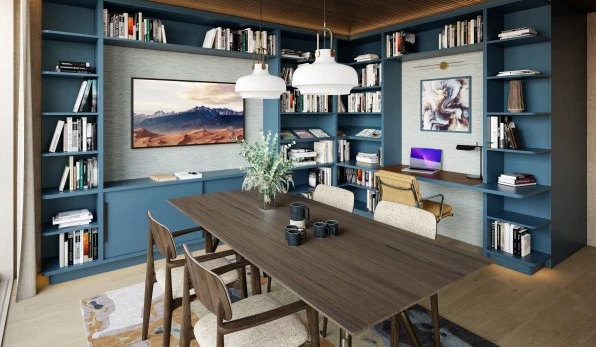 Modern room with bookshelf, table, chairs, and laptops