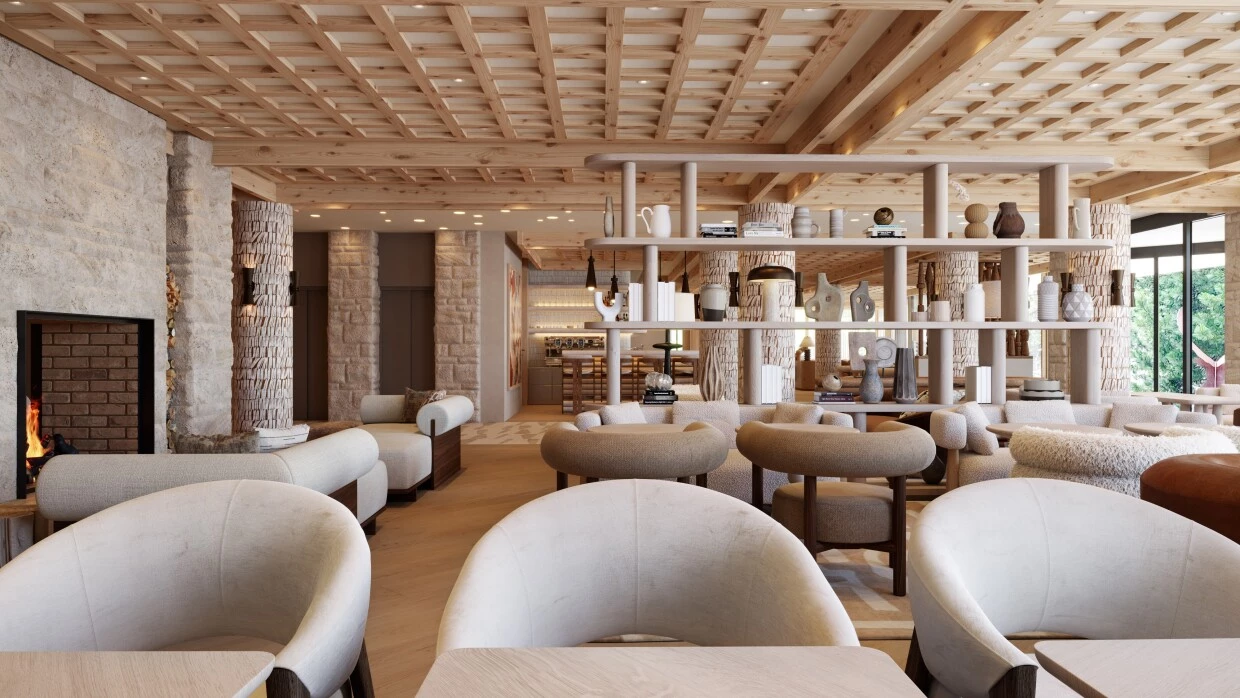 Beige armchairs in the restaurant of a luxury hotel in the Grisons mountains